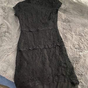 Fitted black lace dress